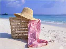 life's a beach - empty beach, chair and hat